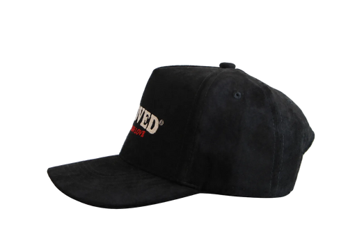 Beloved by Kameron Love black suede cap with red trim, side view